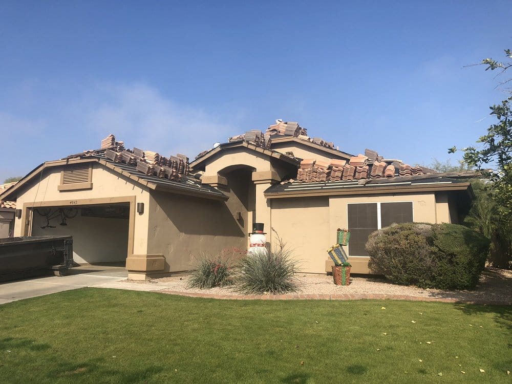 Desert Eagle Home Improvements installing a new tile roof on a Phoenix home.