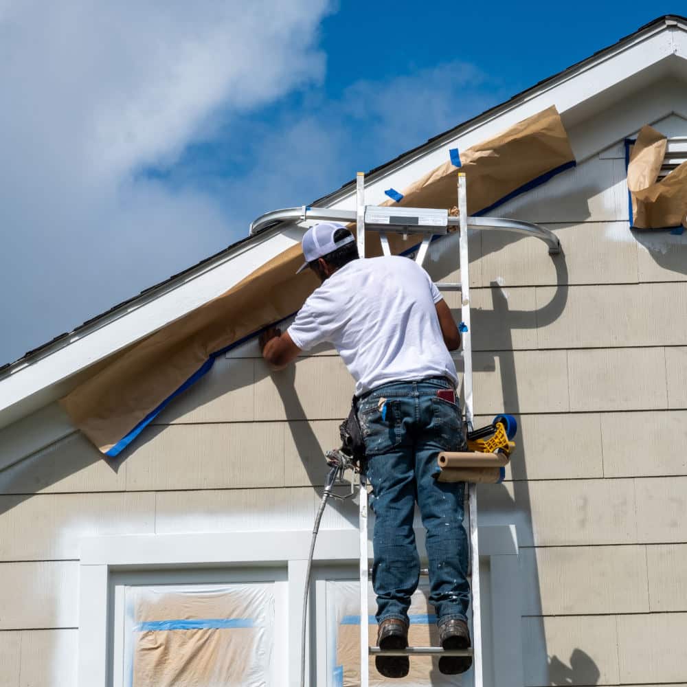 Man preparing house to be painted